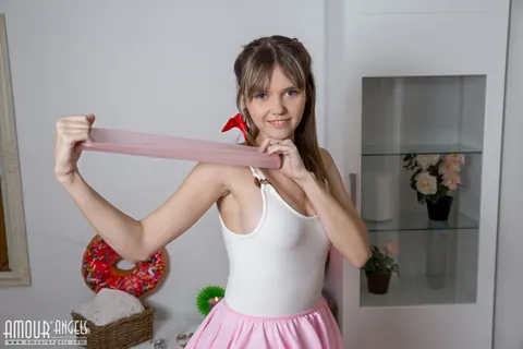 Babe with Small Tits Strips Out of Her Skirt on a Yoga Mat – photo 1 of 20