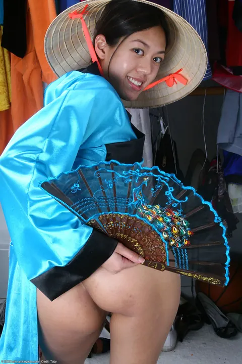 Asian Woman Spreads Her Hairy Pussy in Close-Up – photo 7 of 21