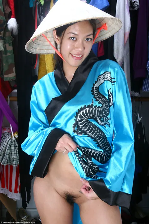 Asian Woman Spreads Her Hairy Pussy in Close-Up – photo 9 of 21