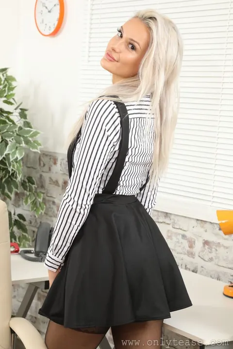 Busty Blonde Strips Out of Her Uniform in the Office – photo 2 of 21