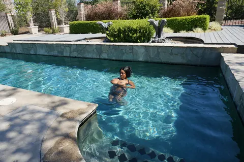 Maserati Xxx: Ebony MILF Flaunts Her Huge Natural Tits by the Pool – photo 17 of 17