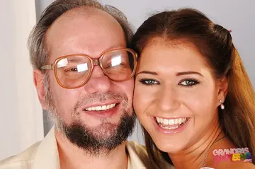 Brunette with Natural Tits and Glasses Sucks and Fucks an Older Man