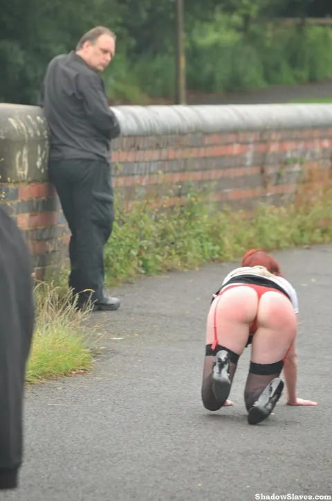 Thick Redhead Licks Boots and Crawls in Restraints Outdoors – photo 15 of 16