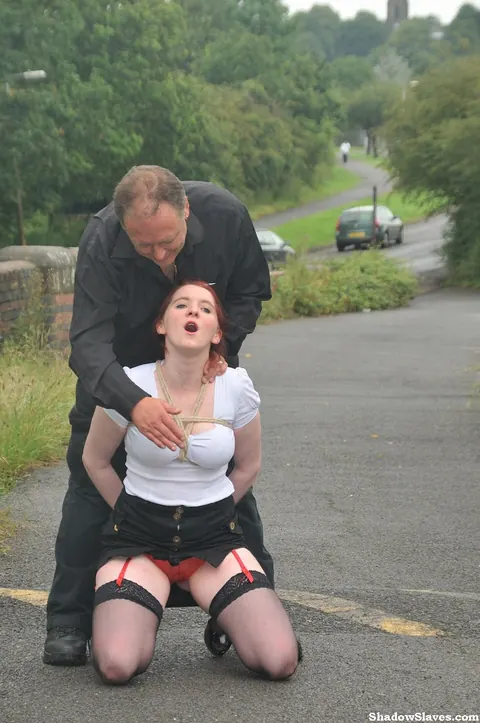Thick Redhead Licks Boots and Crawls in Restraints Outdoors – photo 10 of 16