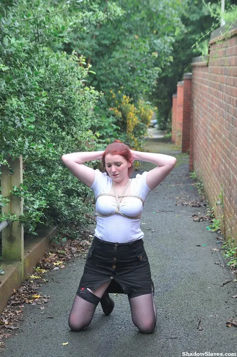Thick Redhead Licks Boots and Crawls in Restraints Outdoors – photo 7 of 16