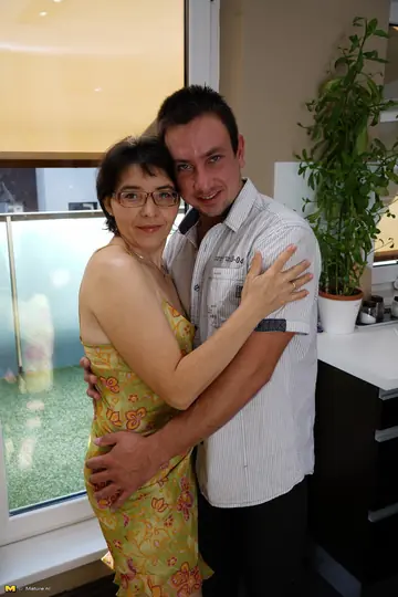 Curvy MILF in Glasses and Skirt Gets Kissed and Fucked in the Kitchen