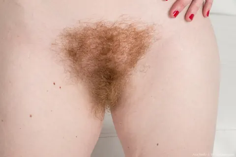Ana Molly: Redhead MILF Strips Off Her Denim Shorts and Thong to Finger Her Hairy Pussy – photo 7 of 16