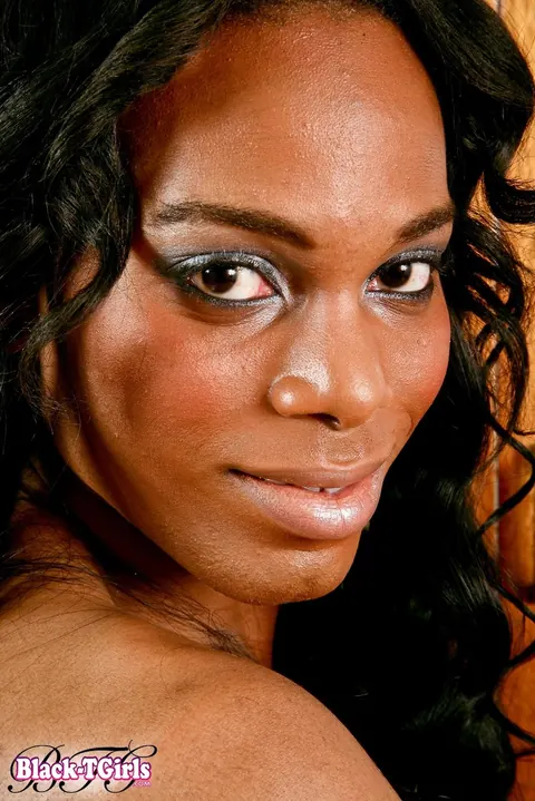 Ebony Trans Woman Undresses and Slowly Strokes Her Cock – photo 1 of 16