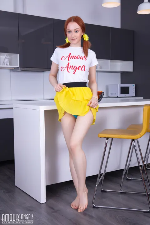 Slim Redhead in Pigtails Spreads Her Shaved Pussy in the Kitchen – photo 4 of 20