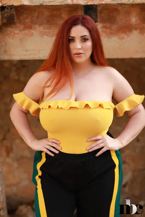Lucy Collett: Curvy Redhead MILF Strips Out of Her Bikini Outdoors – photo 1 of 20