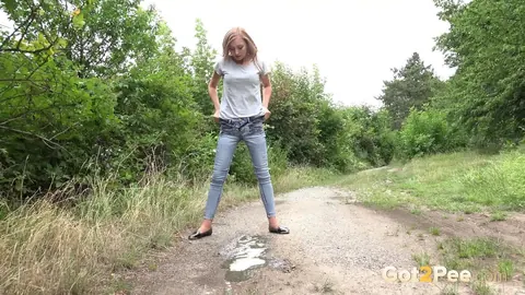 Blonde Spreads Her Hairy Pussy Outdoors in Jeans – photo 12 of 15