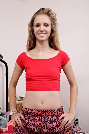Petite Blonde Strips Nude and Shows Her Tattoos