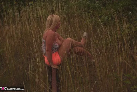 European Blonde MILF Flashes Her Big Natural Tits Outdoors – photo 9 of 20