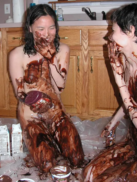 Two Slim Asian Brunettes Share Lesbian Sex in the Kitchen – photo 12 of 21