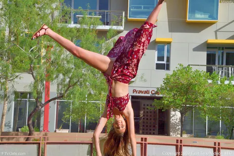 Redhead Does a Handstand and Flashes No Panties Outdoors – photo 14 of 15