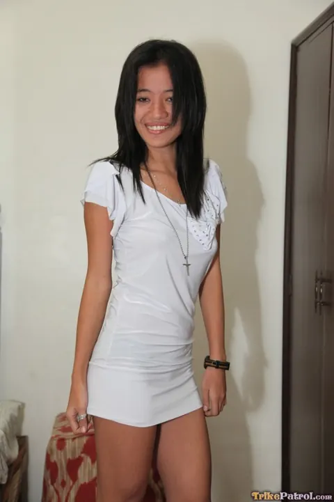 Short-Haired Filipina Strips Off Her Panties in a Hotel Room – photo 1 of 21
