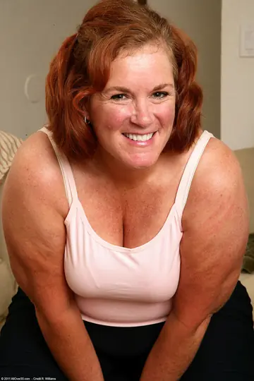 Chubby MILF Strips After a Workout and Fingers Her Hairy Pussy in the Gym