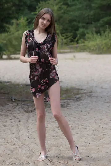 Skinny Woman Strips Off Her Skirt and Spreads Her Legs on the Sand