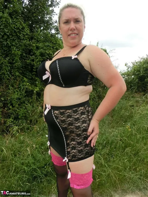 Blonde with Big Tits Poses in Lingerie and Stockings Outdoors – photo 14 of 16