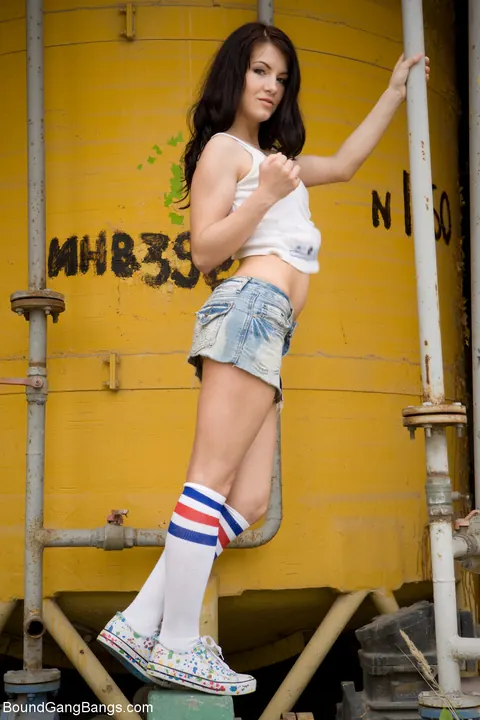 Russian Woman Poses Nude Outdoors by a Yellow Tank – photo 3 of 17