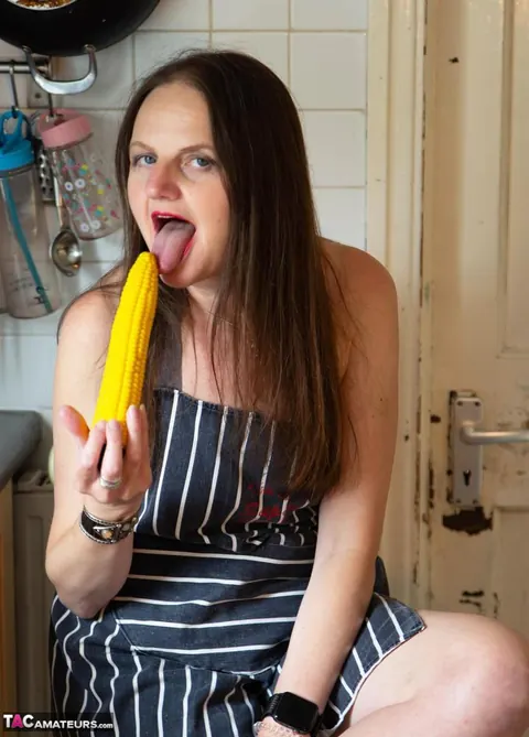 Mature Brunette in High Heels Masturbates with a Dildo in the Kitchen – photo 3 of 16