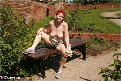 Valgasmic Exposed: Mature Redhead Strips Naked and Spreads Wide in a Public Park – photo 4 of 20