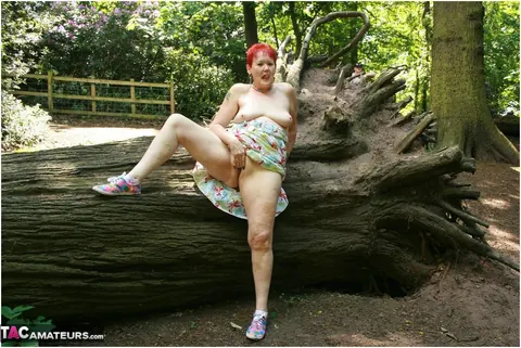 Valgasmic Exposed: Mature Redhead Strips Naked and Spreads Wide in a Public Park – photo 20 of 20