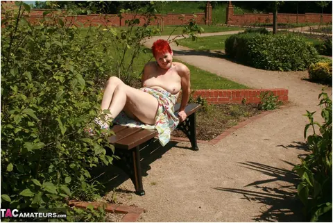 Valgasmic Exposed: Mature Redhead Strips Naked and Spreads Wide in a Public Park – photo 3 of 20