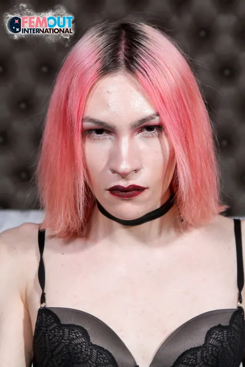 Trans Woman Strips Nude, Turns, and Arches Back to Show Her Body – photo 2 of 16