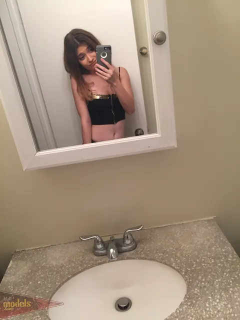 Ariel Mcgwire: Petite Brunette Strips Out of Her Shorts in the Bathroom – photo 5 of 16