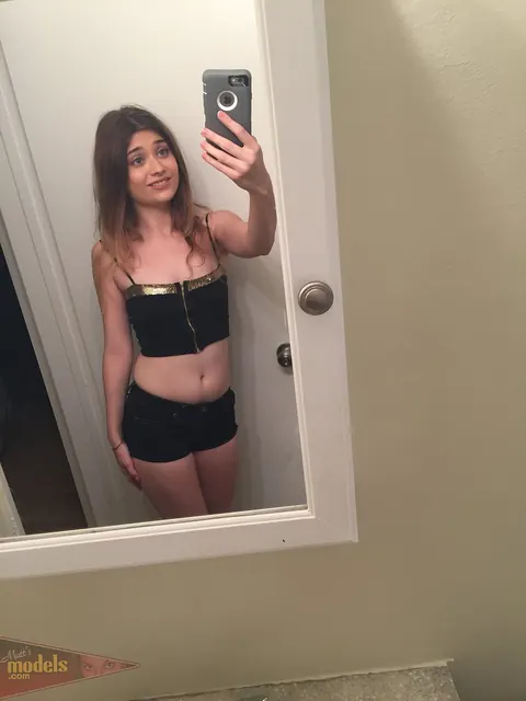 Ariel Mcgwire: Petite Brunette Strips Out of Her Shorts in the Bathroom – photo 1 of 16