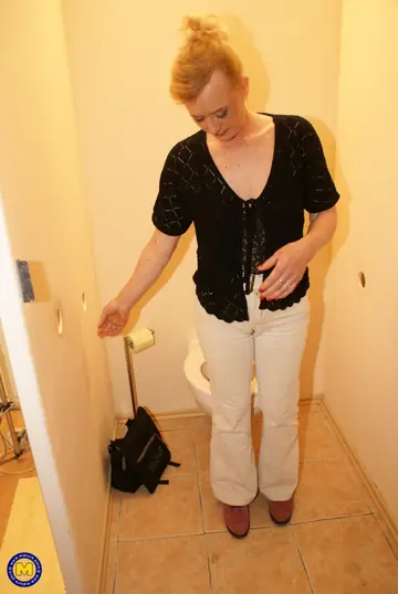 Mature Blonde MILF Sucks BBC and Gets Fucked at the Gloryhole