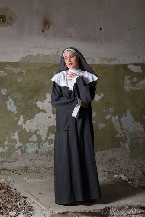 Judith Able: European Brunette Strips Off Her Nun Costume Outdoors and Fingers Her Pussy – photo 2 of 16