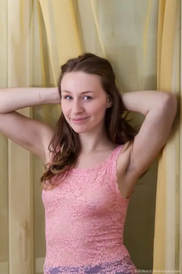Slim Brunette in a Skirt and Pantyhose Spreads Her Hairy Pussy