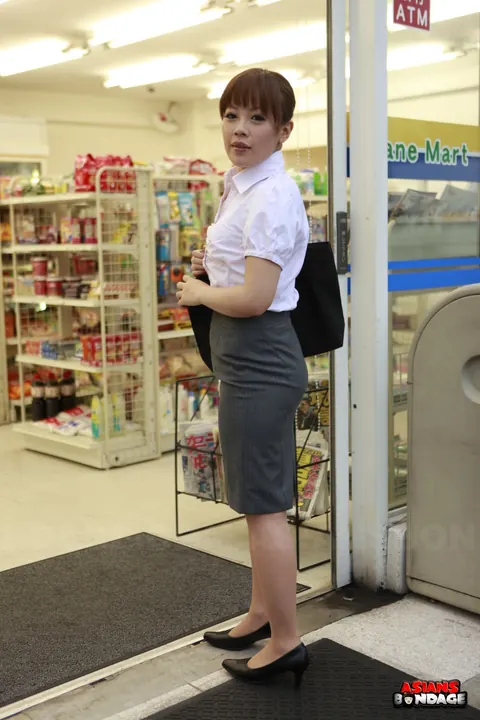 Japanese Redhead Poses in a Skirt Outdoors – photo 5 of 15