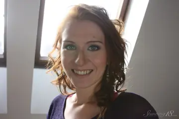 Redhead Strips Out of Her Lingerie and Shorts Then Spreads