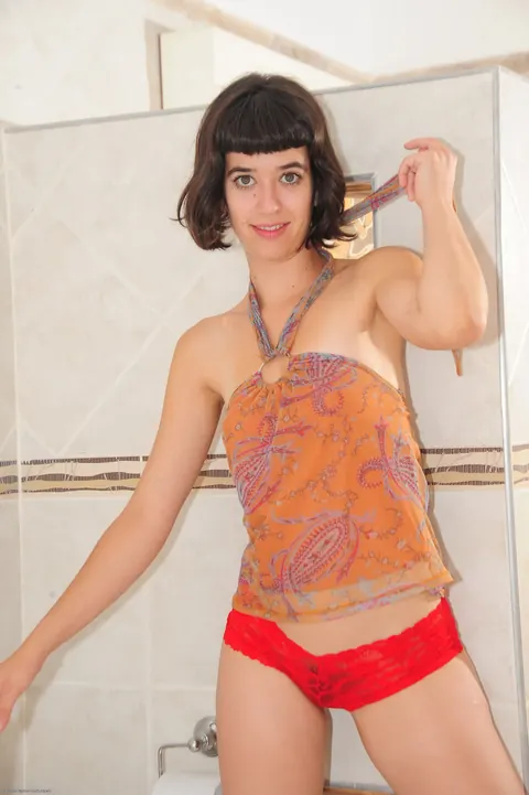 Short-Haired Brunette Strips Nude and Spreads Her Hairy Pussy – photo 1 of 21