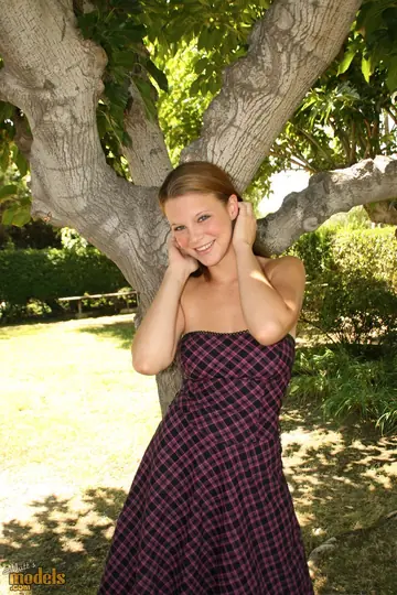 Brunette with Big Natural Tits Spreads Her Pussy on the Garden Bench