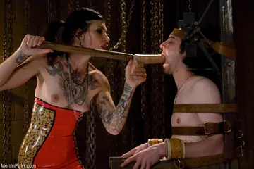 Tattooed Brunette in Latex Dominates with Blowjob and Toy