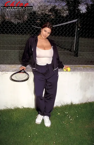 Curvy Brunette MILF Undresses on Tennis Court
