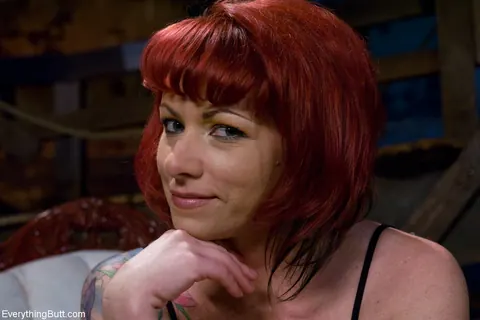 Kylie Ireland: Mature Redhead BBW Shows Her Tattoos in Bondage on the Sofa – photo 15 of 16