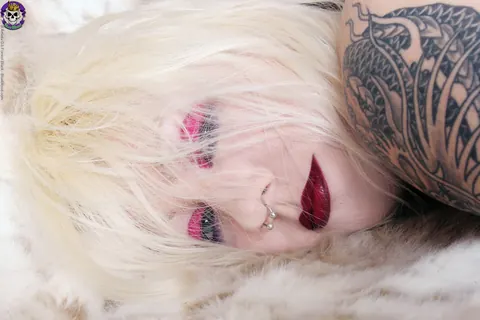 Tattooed Blonde in Lingerie and Stockings Poses – photo 15 of 15