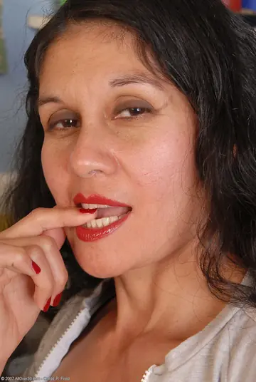 Mature Latina Bares All in the Kitchen and Fingers Her Hairy Pussy