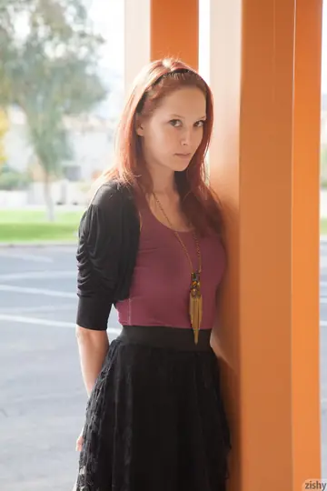 Kimmy Diedrick – Petite Redhead Lifts Her Skirt to Show Purple Panties in the Hotel Lobby