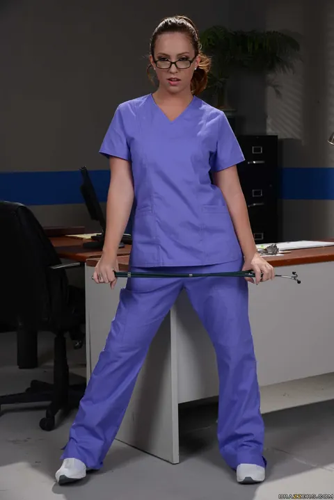 Maddy OReilly: Redhead Nurse Strips Out of Her Uniform in Glasses – photo 3 of 20