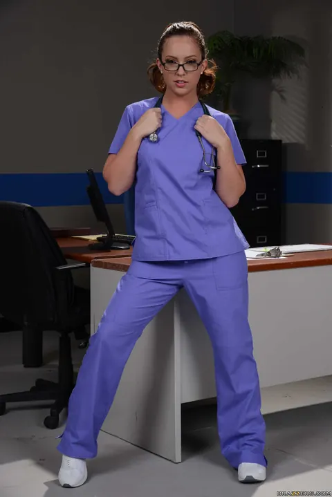 Maddy OReilly: Redhead Nurse Strips Out of Her Uniform in Glasses – photo 5 of 20