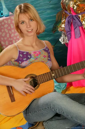 Tall Czech Blonde Toys Her Pussy After Playing Guitar