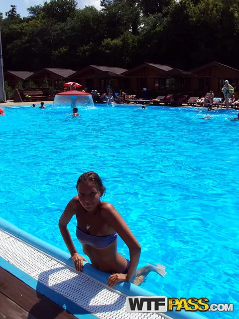 Mango A: Slim Amateur Brunette in a Bikini Poses on the Beach and by the Pool – photo 13 of 16