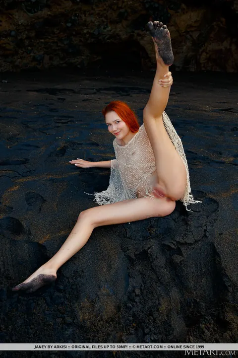 Redhead Strips Naked on Black Sand and Spreads – photo 11 of 18