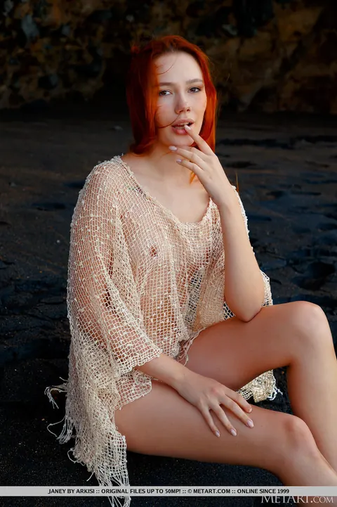 Redhead Strips Naked on Black Sand and Spreads – photo 5 of 18